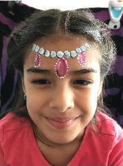 Houston full face painting at your child's birthday party with an example of this beautiful tiara with jewels and gems.