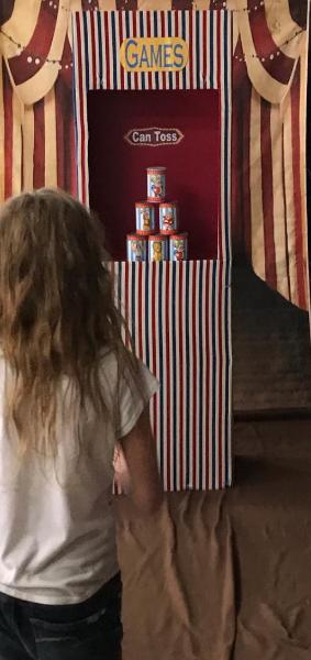 The can toss game is the most iconic carnival game. We have that and 7 more awesome carnival games made to excite your party guests in Houston.