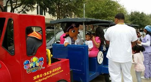 Doc mcstiffins mascot birthday party train ride in tomball, texas.