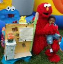 Rent Elmo mascot costumed character for birthday party in Katy, Texas.