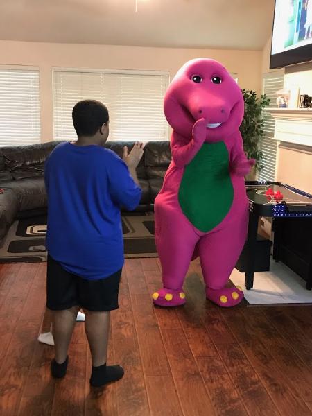 Rent this purple dinosaur for your Houston birthday party for your child's big day. 