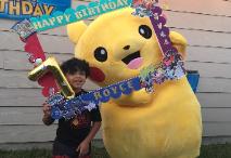 Pikachu mascot costumed character available to hire for birthday parties in Houston, Texas.