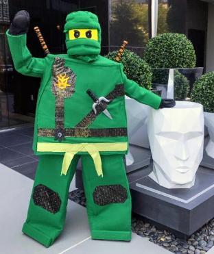 Houston party mascots are here with this green lego party character for birthdays