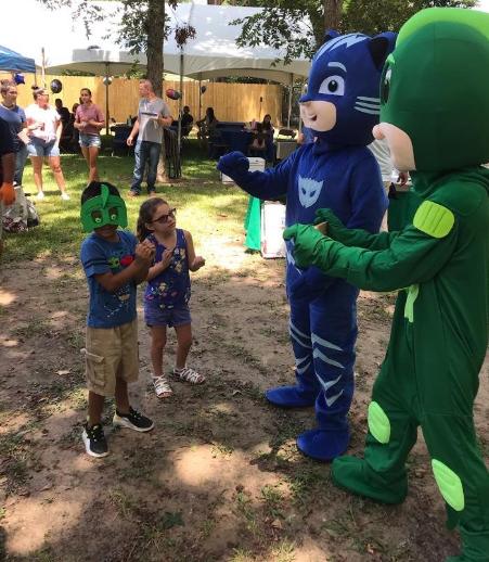 Hire these superhero mascots for your Houston children's birthday party with awesome costumed characters and cool games