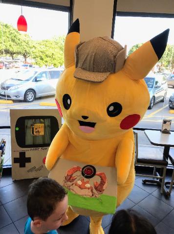 Time to catch the pokemon with this detective electro mouse mascot costumed character in chick fila in Missouri City.