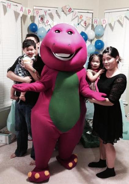 Hire our purple dinosaur mascot party character for your Houston birthday event.