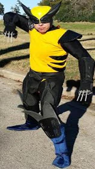 Wolverine has retractable metal claws for superhero birthday party in Houston, Texas.